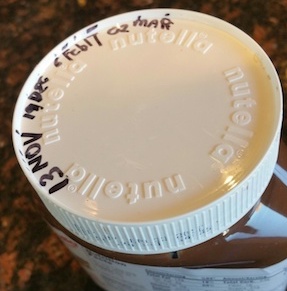 Nutella lid with dates showing how long bottle lasts