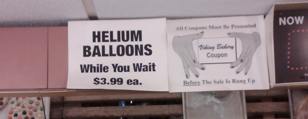Helium Baloons "While You Wait" sign
